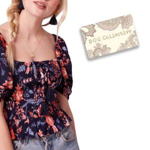 NWT $69 LEON NAVY FLORAL SMOCKED BODICE TOP
